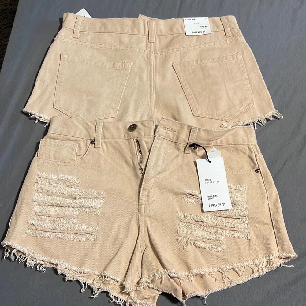 Peach colored denim shorts